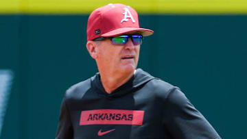 Arkansas Razorback coach Dave Van Horn worked with his infielders during practice before the Super Regional against the Tennessee Volunteers at Baum-Walker Stadium last week in Fayetteville.
