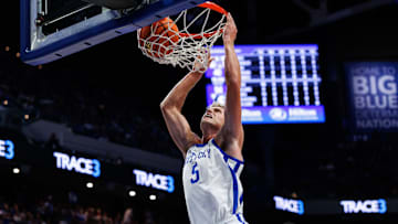 Oct 30, 2025; Lexington, KY, USA; Kentucky Wildcats guard Collin Chandler (5) dunks the ball during the second half against the Georgetown Hoyas at Rupp Arena at Central Bank Center. Mandatory Credit: Jordan Prather-Imagn Images