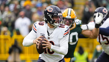Jan 5, 2025; Green Bay, Wisconsin, USA;  Chicago Bears quarterback Caleb Williams (18) during the game against the Chicago Bears at Lambeau Field. Mandatory Credit: Jeff Hanisch-Imagn Images