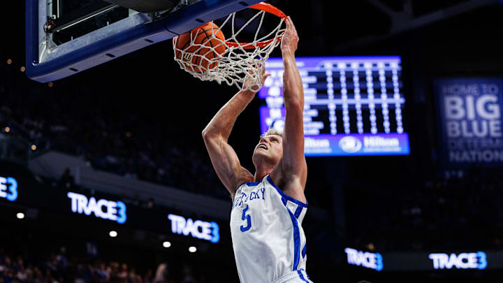 Oct 30, 2025; Lexington, KY, USA; Kentucky Wildcats guard Collin Chandler (5) dunks the ball during the second half against the Georgetown Hoyas at Rupp Arena at Central Bank Center. Mandatory Credit: Jordan Prather-Imagn Images