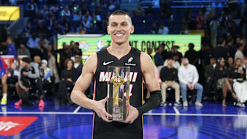 Feb 15, 2025; San Francisco, CA, USA; Miami Heat guard Tyler Herro (14) celebrates with the trophy after winning the three-point contest during All Star Saturday Night ahead of the 2025 NBA All Star Game at Chase Center. Mandatory Credit: Kyle Terada-Imagn Images