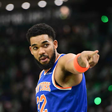 Oct 28, 2025; Milwaukee, Wisconsin, USA; New York Knicks center Karl-Anthony Towns (32) gestures to fans before game against the Milwaukee Bucks at Fiserv Forum. Mandatory Credit: Benny Sieu-Imagn Images