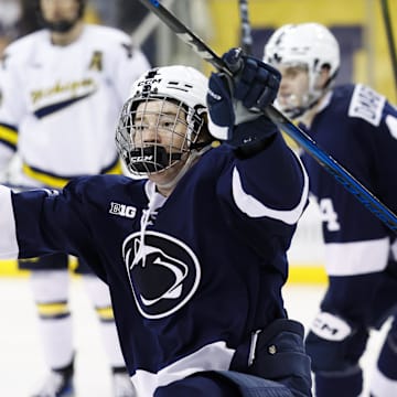 Penn State forward JJ Wiebusch celebrates his game-winning goal in overtime against the Michigan Wolverines during a Big Ten Tournament quarterfinal game at Yost Arena.