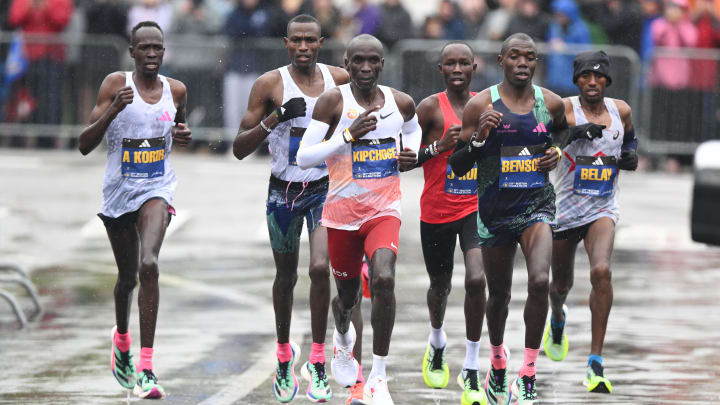 Apr 17, 2023; Boston, MA, USA; Eliud Kipchoge of Kenya and Benson Kipruto of Kenya lead the men s elite pack during the 2023 Boston Marathon. Mandatory Credit: Brian Fluharty-USA TODAY Sports