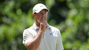 In the final round of the PGA Championship, a volunteer stuck his hand in the water hazard to snag a Rory McIlroy ball. 