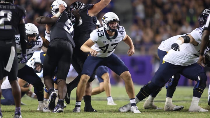 Sep 30, 2023; Fort Worth, Texas, USA; West Virginia Mountaineers long snapper Austin Brinkman (43) blocks on a field goal in the fourth quarter against the TCU Horned Frogs at Amon G. Carter Stadium. 