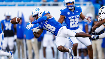 Nov 16, 2024; Lexington, Kentucky, USA; Kentucky Wildcats wide receiver Brandon White (18) looses control of the ball during the third quarter against the Murray State Racers at Kroger Field. Mandatory Credit: Jordan Prather-Imagn Images