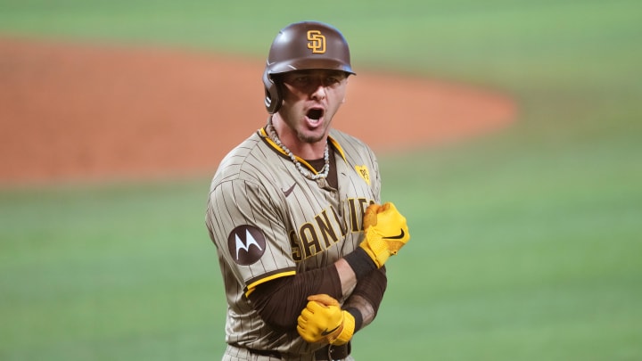 Aug 10, 2024; Miami, Florida, USA;  San Diego Padres center fielder Jackson Merrill (3) celebrates a two-run home run to tie the game in the eighth inning against the Miami Marlins at loanDepot Park.