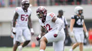 Aug 31, 2024; Nashville, Tennessee, USA;  Virginia Tech Hokies defensive lineman Kelvin Gilliam Jr. (22) celebrates a sack against the Vanderbilt Commodores during the second half at FirstBank Stadium. Mandatory Credit: Steve Roberts-Imagn Images