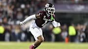 Nov 30, 2024; College Station, Texas, USA; Texas A&M Aggies wide receiver Jabre Barber (1) runs a route during the first quarter against the Texas Longhorns. The Longhorns defeated the Aggies 17-7 at Kyle Field. Mandatory Credit: Maria Lysaker-Imagn Images  