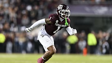 Nov 30, 2024; College Station, Texas, USA; Texas A&M Aggies wide receiver Jabre Barber (1) runs a route during the first quarter against the Texas Longhorns. The Longhorns defeated the Aggies 17-7 at Kyle Field. Mandatory Credit: Maria Lysaker-Imagn Images  