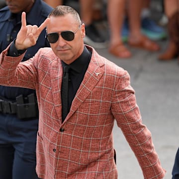 The coaching carousel dominoes hit Texas and Steve Sarkisian in our mostly unserious chain reaction. 
