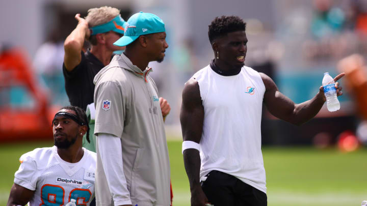 Jul 28, 2024; Miami Gardens, FL, USA; Miami Dolphins wide receiver Tyreek Hill (10) signals during training camp at Baptist Health Training Complex. Mandatory Credit: Sam Navarro-USA TODAY Sports