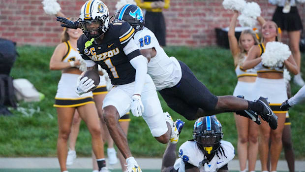 Missouri Tigers wide receiver Theo Wease Jr. (1) runs the ball as Buffalo Bulls safety Marcus Fuqua 