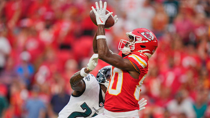 Kansas City Chiefs wide receiver Tyquan Thornton (80) makes a reception for a touchdown defended by Philadelphia Eagles cornerback Quinyon Mitchell (27) during the fourth quarter of the game at GEHA Field at Arrowhead Stadium.