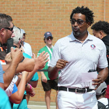 Aug 5, 2023; Canton, OH, USA;  Cris Carter arrives on the red carpet for the 2023 Pro Football Hall of Fame Enshrinement at Tom Benson Hall of Fame Stadium. Mandatory Credit: Kirby Lee-Imagn Images