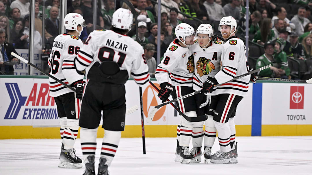 Mar 8, 2026; Dallas, Texas, USA; Chicago Blackhawks defenseman Sam Rinzel (6) and center Ryan Donato (8) and center Teuvo Teravainen (86) and center Frank Nazar (91) celebrate the game tying goal scored by center Connor Bedard (98) against the Dallas Stars during the third period at the American Airlines Center. Mandatory Credit: Jerome Miron-Imagn Images