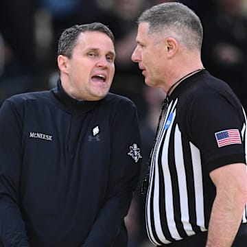 Mar 22, 2025; Providence, RI, USA; McNeese State Cowboys head coach Will Wade talks to an official during the second half of a second round men’s NCAA Tournament game against the Purdue Boilermakers at Amica Mutual Pavilion. Mandatory Credit: Brian Fluharty-Imagn Images