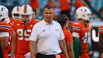 Sep 7, 2024; Miami Gardens, Florida, USA; Miami Hurricanes head coach Mario Cristobal walks on the field before the game against the Florida A&M Rattlers at Hard Rock Stadium. Mandatory Credit: Sam Navarro-Imagn Images