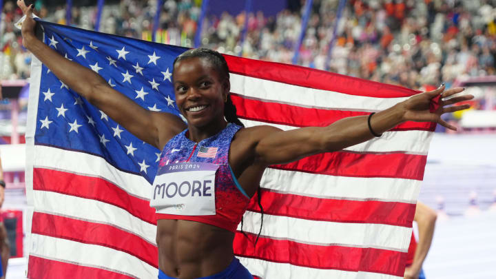 Jasmine Moore celebrates a third place finish in the women's triple jump final in the Paris 2024 Olympic on Aug. 3, 2024.