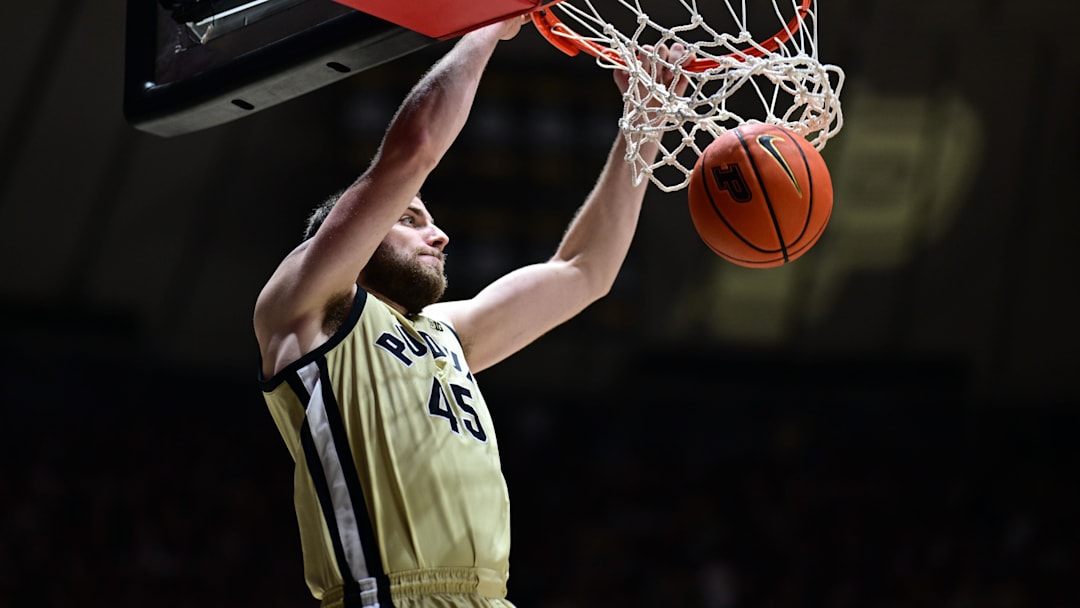 Purdue Boilermakers center Oscar Cluff (45) dunks the ball 