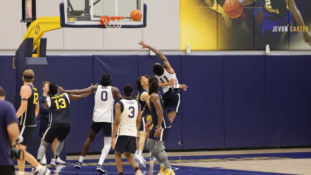 West Viriginia University guard Jonathan Powell (11)