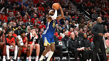 Golden State Warriors guard Buddy Hield attempts a shot against the Portland Trail Blazers