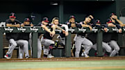 Aug 23, 2025; Arlington, Texas, USA; The Cleveland Guardians players look down from the team dugout during the game against the Texas Rangers at Globe Life Field. Mandatory Credit: Jerome Miron-Imagn Images