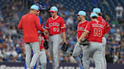 Jul 4, 2025; Toronto, Ontario, CAN; Los Angeles Angels pitcher Kyle Hendricks (28) is relieved by interim manager Ray Montgomery (81) against the Toronto Blue Jays during the sixth inning at Rogers Centre. Mandatory Credit: Nick Turchiaro-Imagn Images