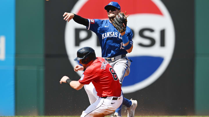 Aug 26, 2024; Cleveland, Ohio, USA; Kansas City Royals second baseman Michael Massey (19) forces out Cleveland Guardians center fielder Lane Thomas (8) during the first inning at Progressive Field. Mandatory Credit: Ken Blaze-USA TODAY Sports