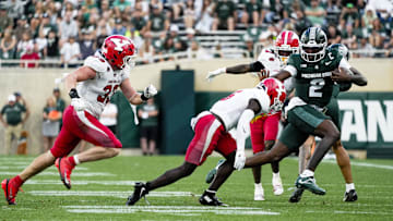 Sep 13, 2025; East Lansing, Michigan, USA; Michigan State quarterback Aidan Chiles (2) runs with the ball against Youngstown State in the fourth quarter at Spartan Stadium. Mandatory Credit: Brendan Mullin-Imagn Images