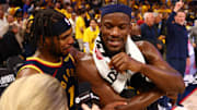 Apr 28, 2025; San Francisco, California, USA; Golden State Warriors guard Buddy Hield (7) celebrates with forward Jimmy Butler III (10) as he speaks to TNT after the game four of the 2025 NBA Playoffs first round against the Houston Rockets at Chase Center. Mandatory Credit: Kelley L Cox-Imagn Images