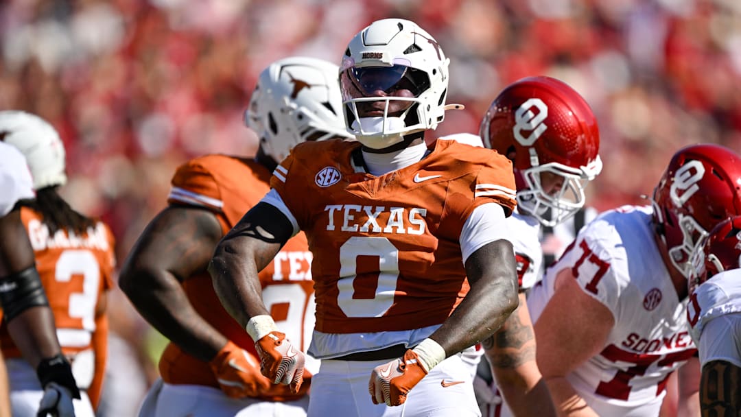 Texas Longhorns linebacker Anthony Hill Jr. celebrates during the game between the Texas Longhorns and the Oklahoma Sooners at the Cotton Bowl Texas Longhorns linebacker Anthony Hill Jr. celebrates during the game between the Texas Longhorns and the Oklahoma Sooners at the Cotton Bowl