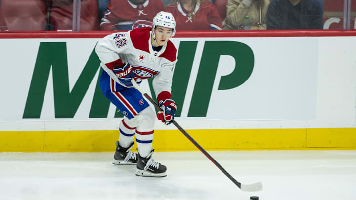 Apr 11, 2025; Ottawa, Ontario, CAN; Montreal Canadiens defenseman Lane Hutson (48) skates with the puck in the third period against the Ottawa Senators at the Canadian Tire Centre. Mandatory Credit: Marc DesRosiers-Imagn Images