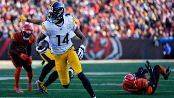 Pittsburgh Steelers wide receiver George Pickens (14) breaks through the defense for a touchdown reception in the first quarter of the NFL Week 13 game between the Cincinnati Bengals and the Pittsburgh Steelers at Paycor Stadium in downtown Cincinnati on Sunday, Dec. 1, 2024.