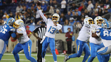 Jul 31, 2025; Canton, Ohio, USA;  Los Angeles Chargers quarterback DJ Uiagalelei (13) passes against the Detroit Lions in the second half at Tom Benson Hall of Fame Stadium. Mandatory Credit: Charles LeClaire-Imagn Images
