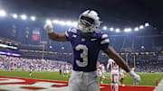 Kansas State running back Dylan Edwards (3) celebrates the go-ahead touchdown against Rutgers during the second half of the Rate Bowl at Chase Field on Dec. 26, 2024, in Phoenix.