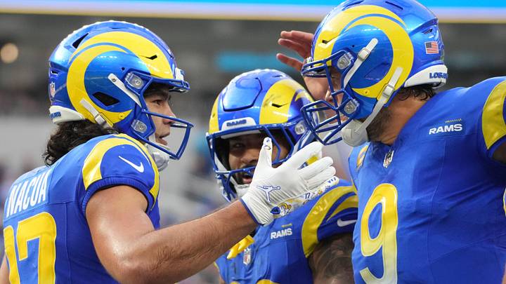 Los Angeles Rams wide receiver Puka Nacua (17) celebrates with quarterback Matthew Stafford (9) and running back Kyren Williams (23). Mandatory Credit: Kirby Lee-Imagn Images
