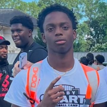 Miami 4-star 2026 CB Rodarion Jones with coach Kirby Smart.