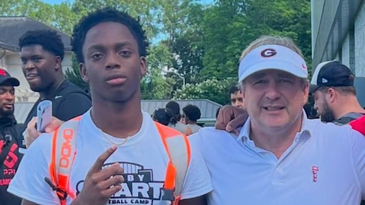 Miami 4-star 2026 CB Rodarion Jones with coach Kirby Smart.
