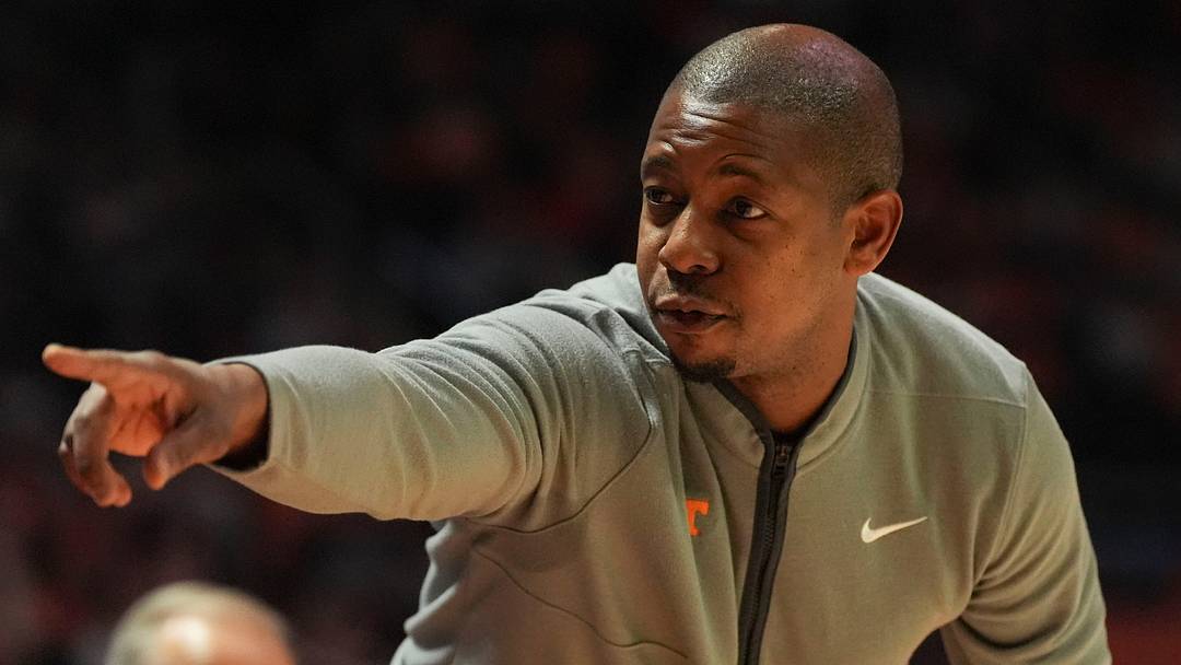 Tennessee associate basketball coach Justin Gainey tells players to sub in during an NCAA college basketball game against Gardner-Webb on Dec. 21, 2025, in Knoxville, Tennessee.