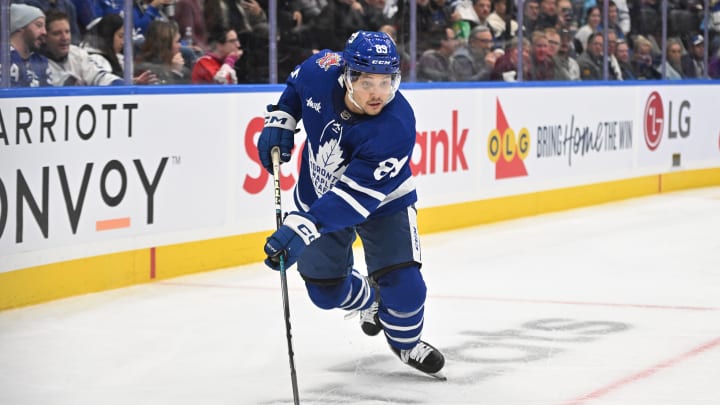 Nov 8, 2023; Toronto, Ontario, CAN; Toronto Maple Leafs forward Nick Robertson (89) skates with the puck against the Ottawa Senators in the third period at Scotiabank Arena. Mandatory Credit: Dan Hamilton-USA TODAY Sports