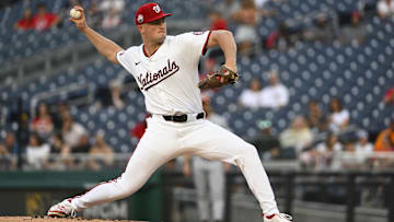 Jul 22, 2025; Washington, District of Columbia, USA; Washington Nationals starting pitcher Brad Lord (61) throws to the Cincinnati Reds during the second inning at Nationals Park. 
