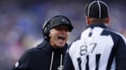 Dec 7, 2025; Baltimore, Maryland, USA; Baltimore Ravens head coach John Harbaugh shouts at line judge Tom Eaton (87) after a call following a play against the Pittsburgh Steelers during the first half at M&T Bank Stadium. Mandatory Credit: Peter Casey-Imagn Images