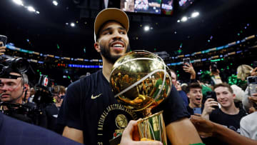 Jun 17, 2024; Boston, Massachusetts, USA; Boston Celtics forward Jayson Tatum (0) celebrates with the Larry O’Brian Trophy after beating the Dallas Mavericks in game five of the 2024 NBA Finals to win the NBA Championship at TD Garden. Mandatory Credit: Peter Casey-USA TODAY Sports