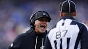 Dec 7, 2025; Baltimore, Maryland, USA; Baltimore Ravens head coach John Harbaugh shouts at line judge Tom Eaton (87) after a call following a play against the Pittsburgh Steelers during the first half at M&T Bank Stadium. Mandatory Credit: Peter Casey-Imagn Images