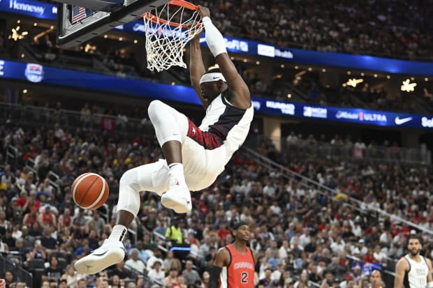 USA forward Bam Adebayo dunks the ball.