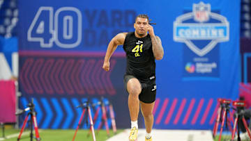 Feb 27, 2025; Indianapolis, IN, USA; Miami defensive lineman Tyler Baron (DL41) participates in drills during the 2025 NFL Combine at Lucas Oil Stadium. Mandatory Credit: Kirby Lee-Imagn Images