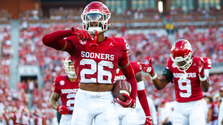 Aug 30, 2024; Norman, Oklahoma, USA; Oklahoma Sooners defensive back Kani Walker (26) celebrates with teammates after making an interception during the first quarter against the Temple Owls at Gaylord Family-Oklahoma Memorial Stadium. Mandatory Credit: Kevin Jairaj-USA TODAY Sports