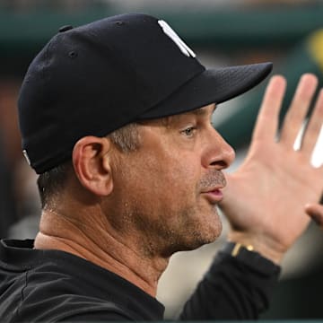 Aug 27, 2024; Washington, District of Columbia, USA; New York Yankees manager Aaron Boone (17) gestures in the dugout against the Washington Nationals during the fourth inning at Nationals Park. Mandatory Credit: Rafael Suanes-Imagn Images